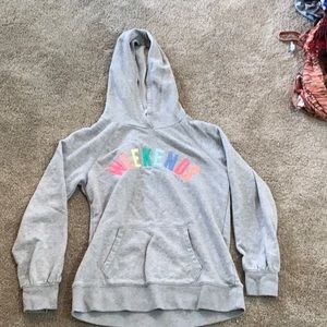 Grey hoodie with the word weekend on it.